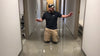 How does and above knee amputee stand after a fall.