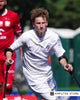15-year-old Team USA amputee soccer player competing on forearm crutches at an international tournament.