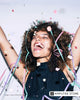 Smiling woman celebrating with confetti, symbolizing resetting health, space, and personal goals in the new year. 