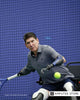 Quadruple amputee tennis player Ron Rosas returns to wheelchair tennis after sepsis, using a specialized prosthetic arm and prosthetic legs.