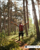Lower-limb prosthesis user hiking on a forest trail, showing how nature walks can support mental health, emotional well-being, and recovery after limb loss.