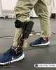 Experimental lightweight ankle-foot orthosis with carbon-fiber frame, adjustable components, and electronics, developed for adaptive ankle support research at Northern Arizona University.