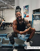 Nelson Thomas, The Challenge’s first-ever amputee competitor, sits in a gym wearing a prosthetic leg; he was later disqualified from the show.