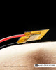 Close-up of a gold thermoelectric patch on human skin, illustrating new prosthetic technology that allows bionic limbs to feel temperature.