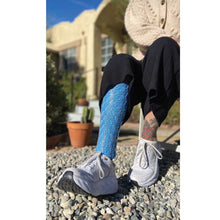Load image into Gallery viewer, Amplified Prosthetic Cover in blue with hex pattern.