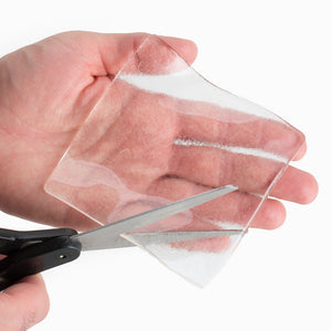 Use a scissors to trim silipos gel squares to fit your prosthetic socket.